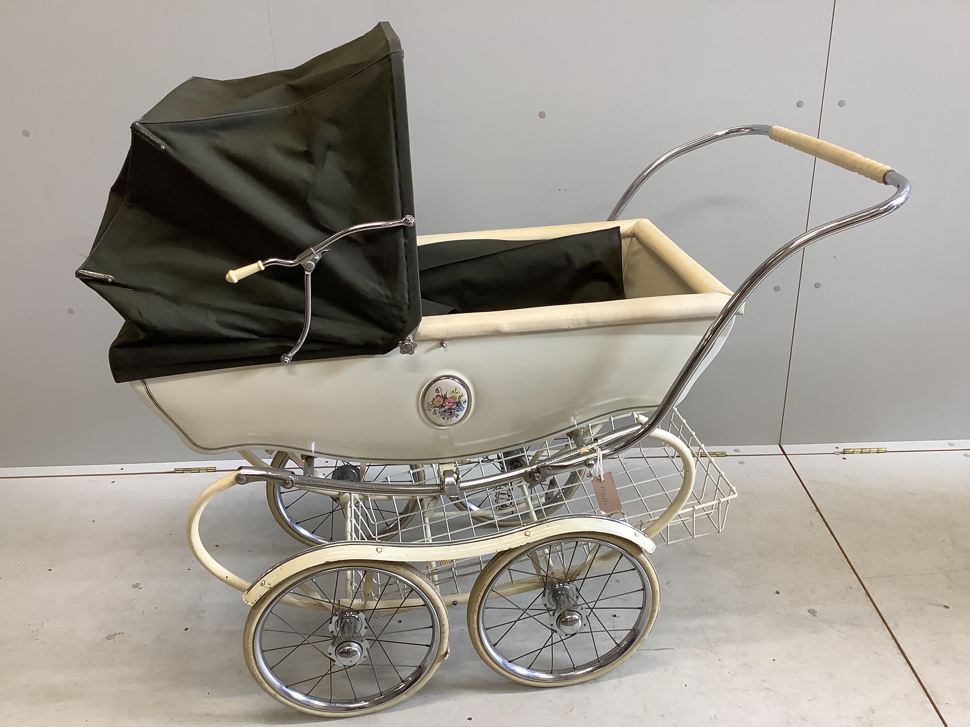 A vintage Silver Cross pram, height 112cm